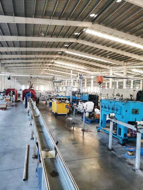 Industrial hose manufacturer facility for large scale custom hose production